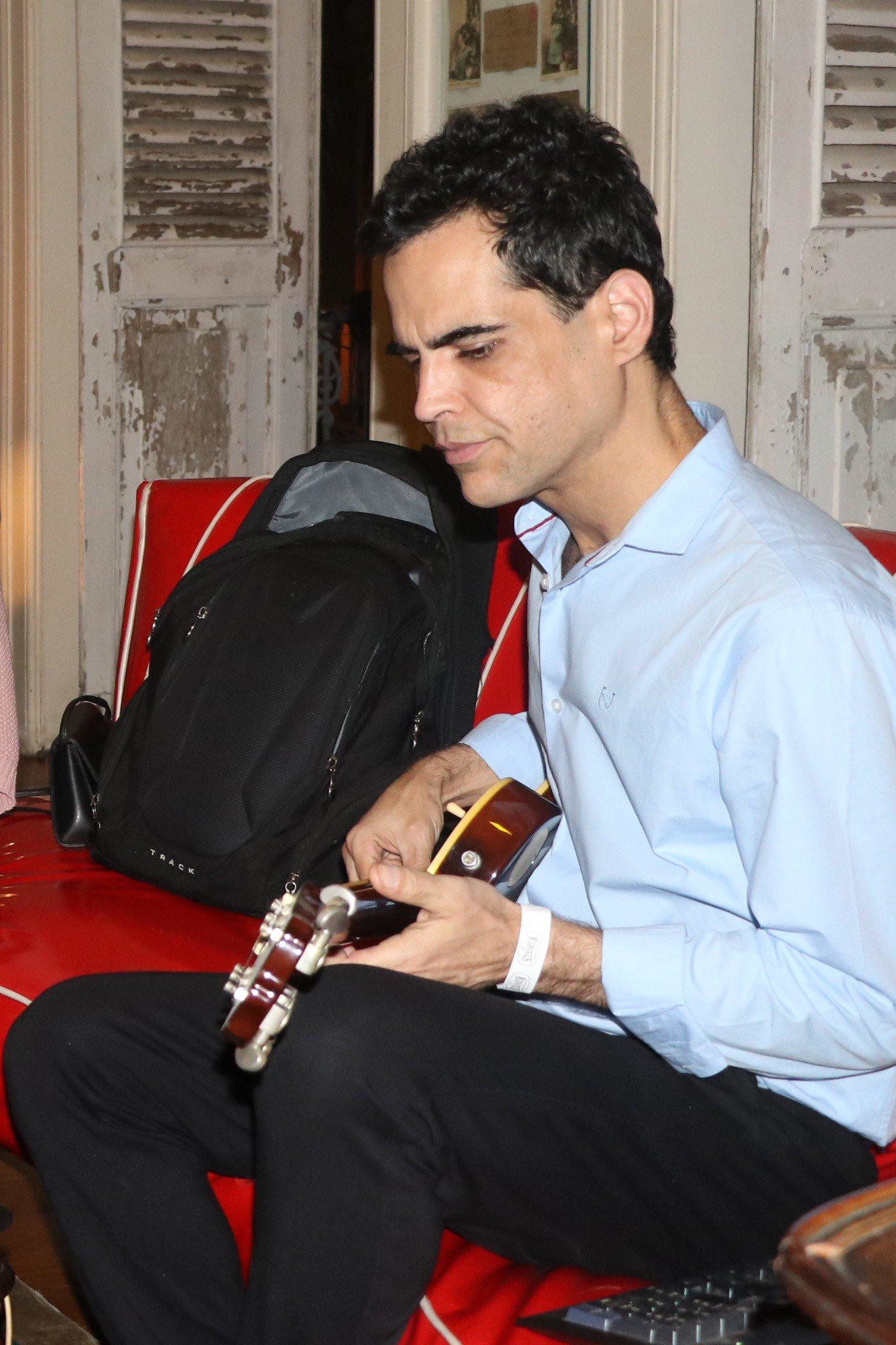 Rodrigo Rodriguez playing guitar